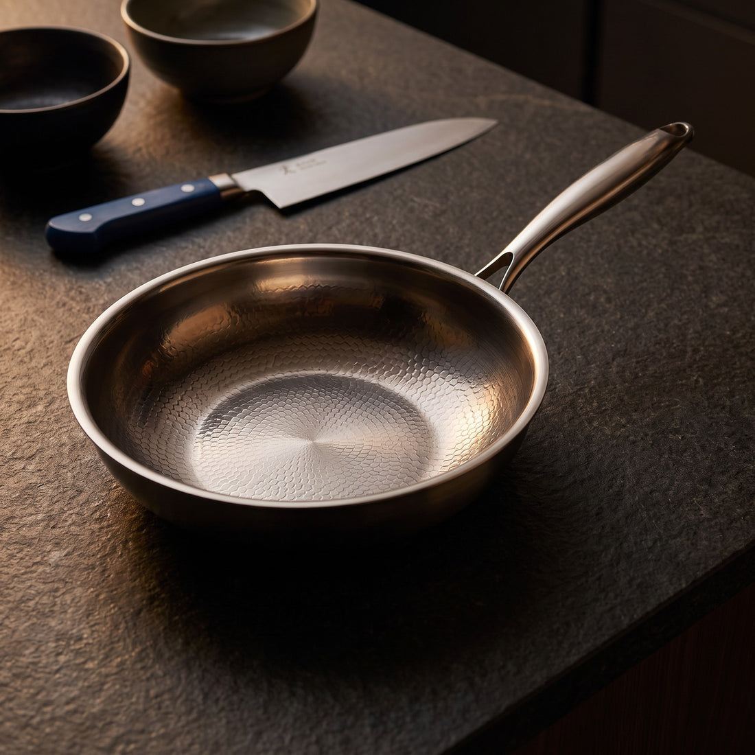 Hatori Kōmyō 光明 Series – Hammered Titanium Wok, on the counter