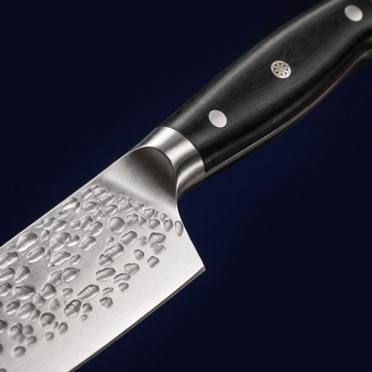Hatori Yoru 夜 Series – Hammered Chef's Knife 20 cm, close-up of the bolster