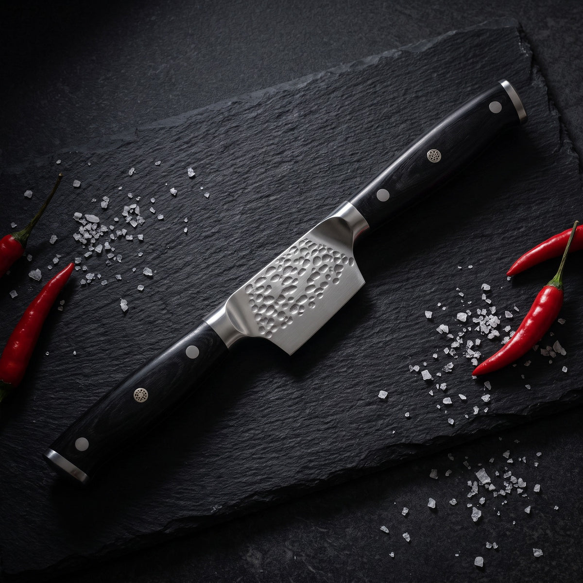 Hatori Yoru 夜 Series – Hammered Chef's Knife 20 cm, on a board