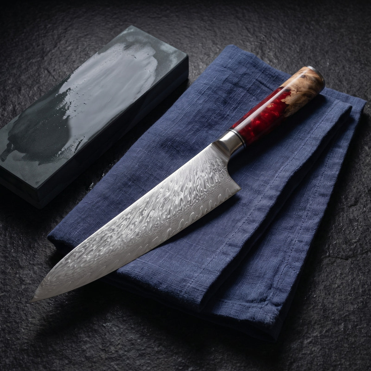 Hatori Kurenai 紅 Series – Damascus Santoku 17.6 cm, on a board