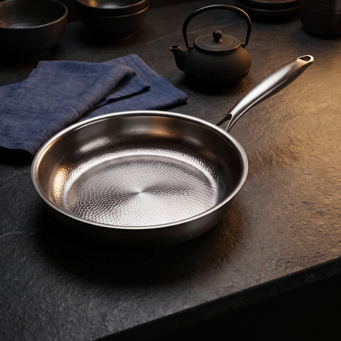 Hatori Kōmyō 光明 Series – Hammered High-Wall Titanium Pan, on the counter