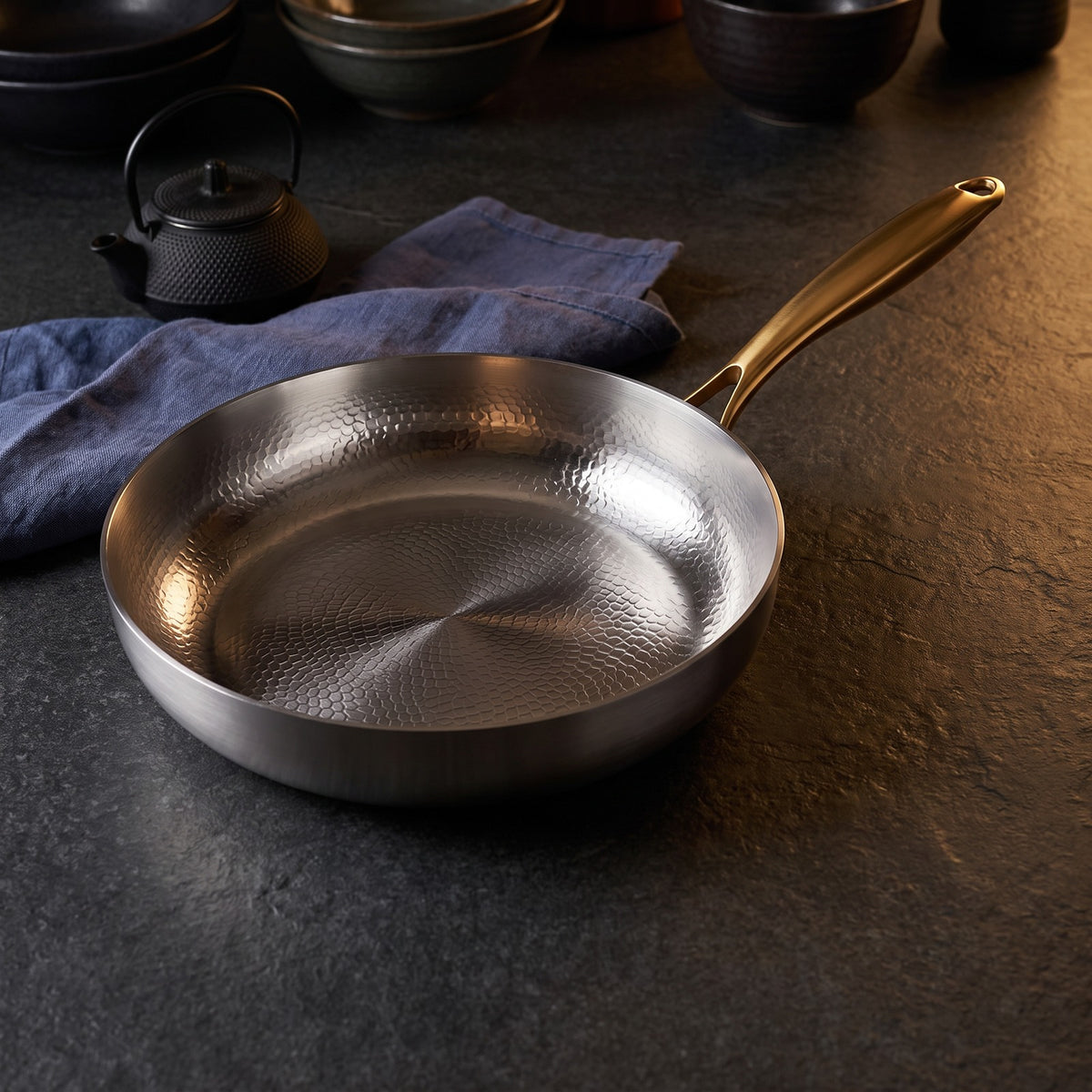 Hatori Kōmyō 光明 Kin 金 Edition – Hammered High-Wall Titanium Pan, on the counter