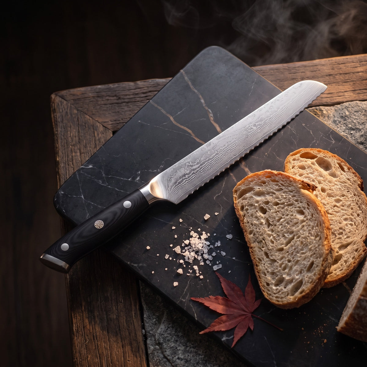 Hatori Kokuyō 黒曜 Series – Damascus Bread Knife 19.5 cm, on the board