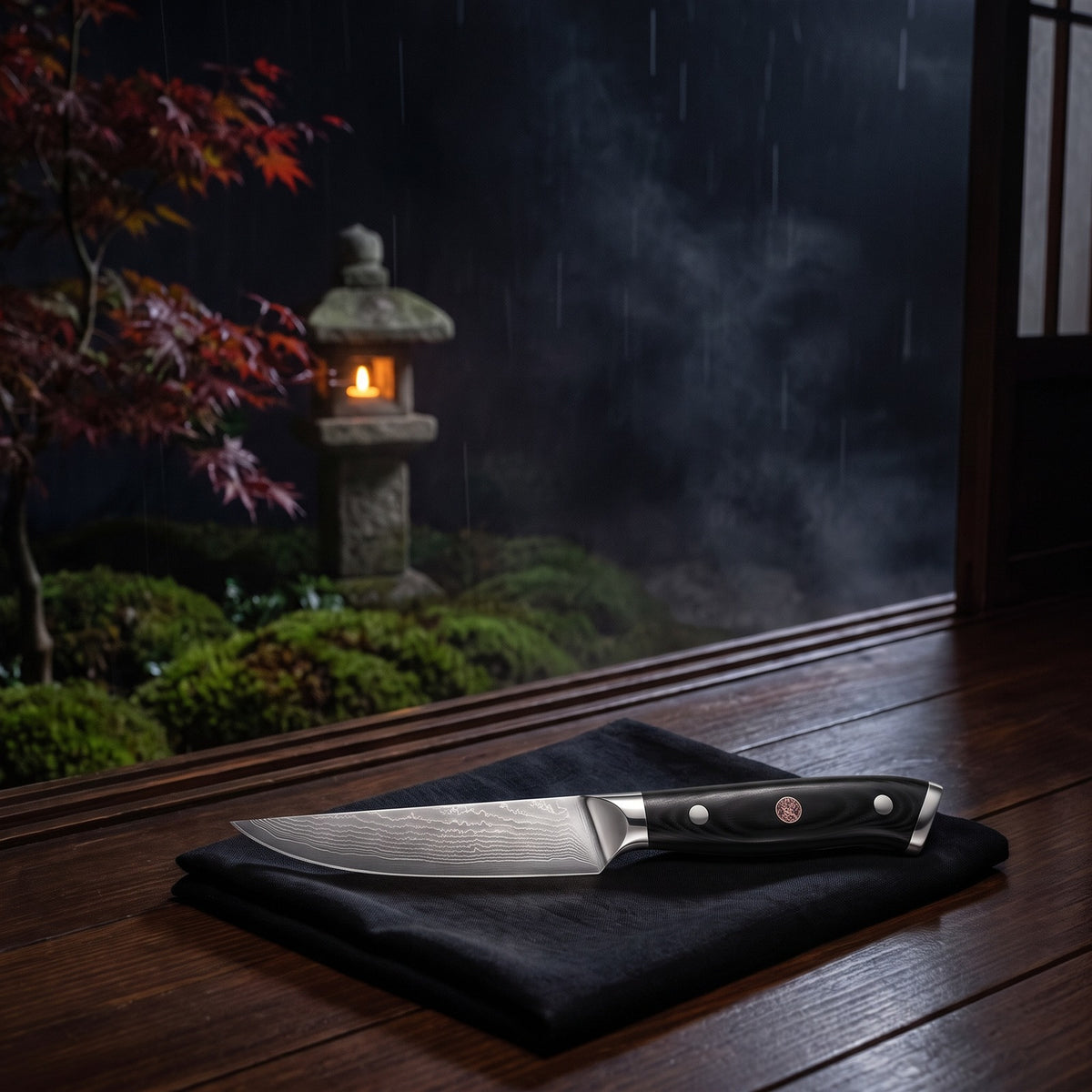 Hatori Kokuyō 黒曜 Series – Damascus Steak Knives, Set of 4, in the garden
